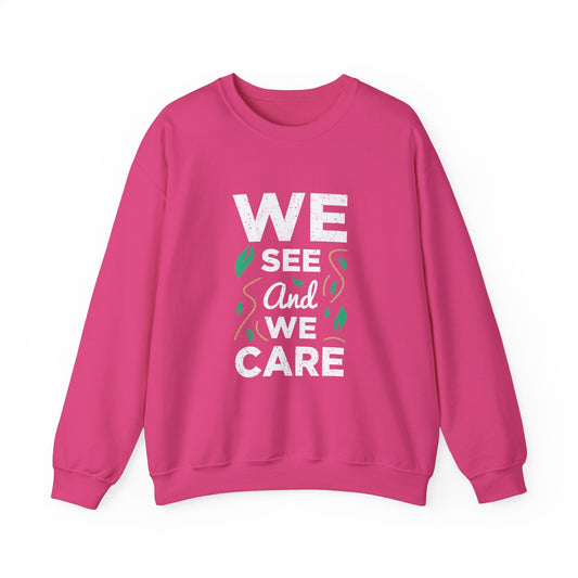 We See And We Care Unisex Heavy Blend™ Crewneck Sweatshirt